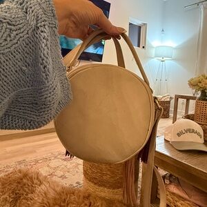 Cream Crossbody Bag with Round Shape and Minimalist Design